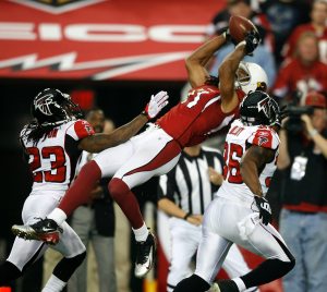 Cards come up aces, top Falcons in playoffs 