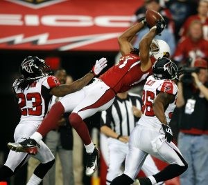 Cards come up aces, top Falcons in playoffs 