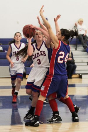 JOY ON THE COURT: Sisters turn Eagles into 1A title contenders 