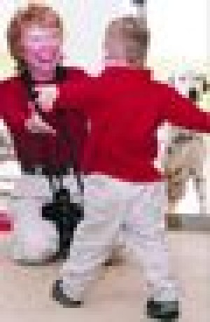 Photographer develops keys to photographing special needs children 