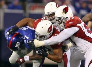 Cardinals' defense beats back Giants 