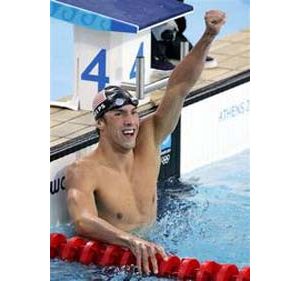 Phelps captures gold, sets world record 
