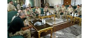 Commander briefs Bush from inside Saddam's palace 