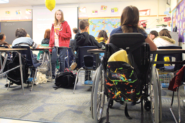 Mackenzie Saunders returns to school 