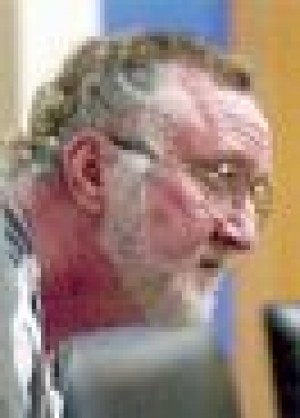 Doctor says he was examining, not fondling 