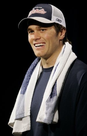 Super Bowl hype fixates on couple, Brady’s foot 