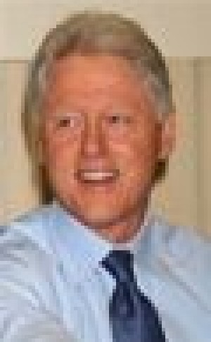Clinton breathing on own after surgery 