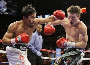 Pacquiao stuns Hatton with second-round KO 
