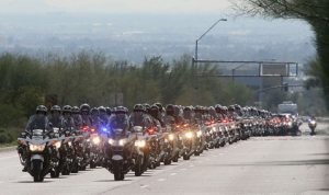 Thousands mourn loss of slain policeman 