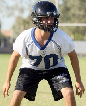 Prep football notes: Coach tries other side of rivalry 