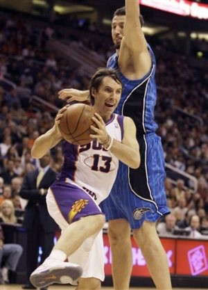 Suns work late Magic to win 