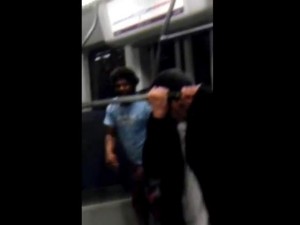 Sword swinging hero rescues man on light rail