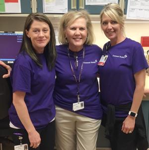 Employees wear purple at Fremont Health