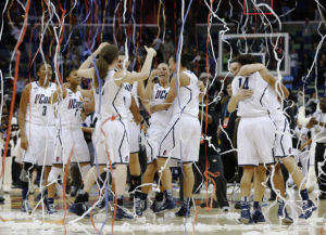 UConn women rout Louisville for eighth title
