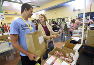 Teachers feel the love at annual school supply giveaway