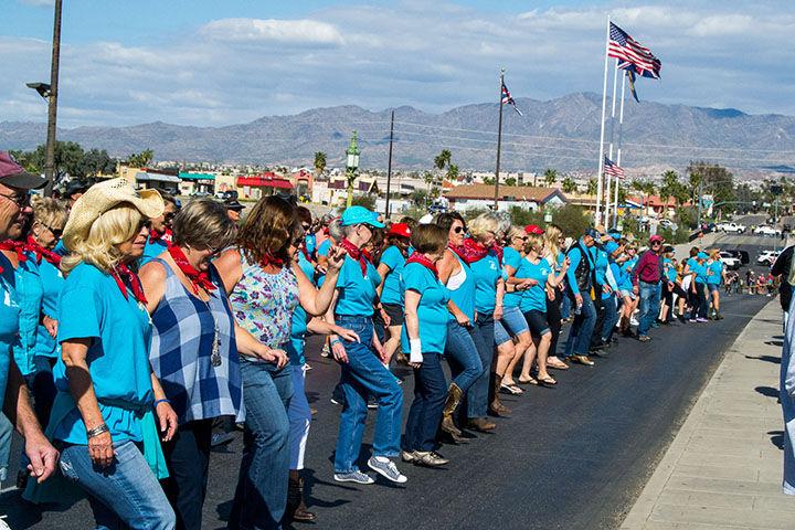 Students get in on fun during line dance event on the London Bridge - Today's News-Herald