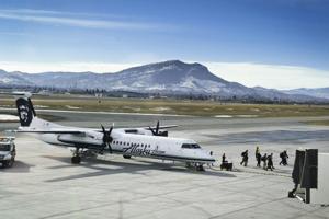 Airport authority asks city, county to support bid for new service