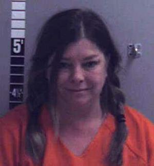 Helena woman accused of attack with bear statue