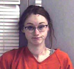 Police: Woman had meth while trying to forcefully enter home