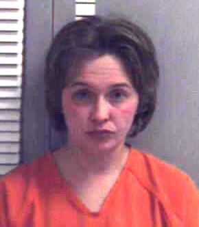 Helena woman accused of threatening cop with scissors at police station