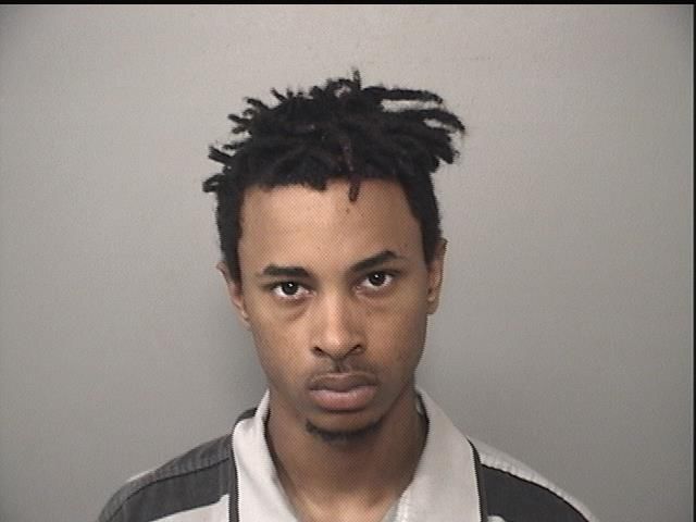 Gunshot victim charged with selling heroin, possessing