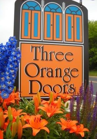 Three Orange Doors