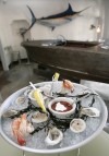 Slurp fresh oysters at Tempest’s glam happy hour