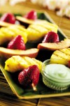 Grilled fruit kabobs with tropical yogurt sauce