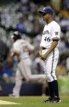 Brewers' bats silenced again in 14-inning loss to Giants