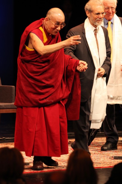Dalai Lama waves to crowd
