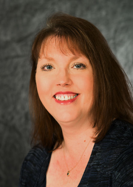 Business Briefs: <b>Michele Heil</b> promoted at health center - 51ae2a7735b09.image