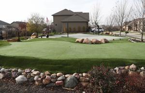 Man refuses to remove golf amenities from backyard