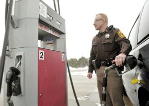 Low gas prices mean savings for city, county departments