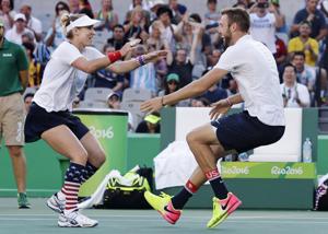 Sock wins gold in mixed doubles
