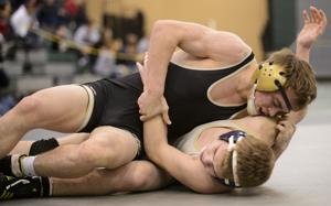 Prep wrestling: New faces, and familiar ones, win HAC titles