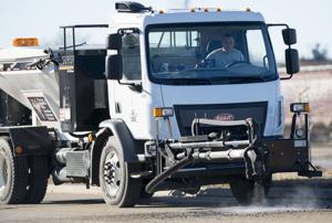 Pothole patching trucks part of better-funded, improved street program