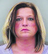 Woman charged with defrauding DHHS