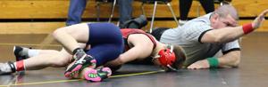 Wrestlers pick up win at home