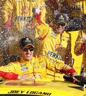 Logano spins out Kenseth for victory