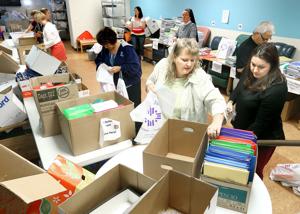 Donations still needed as Catholic Charities, Salvation Army hand out school supplies