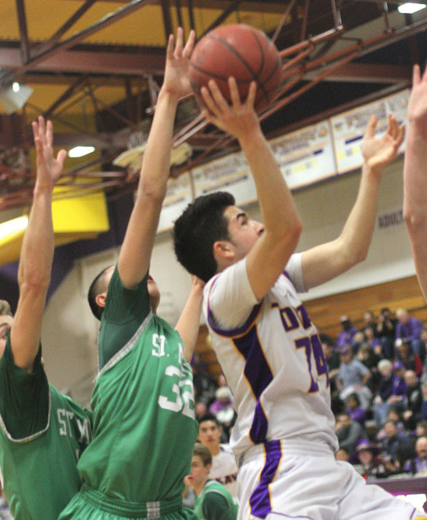 Boys basketball: Tigers hang tough for a half, but Rams pull away 