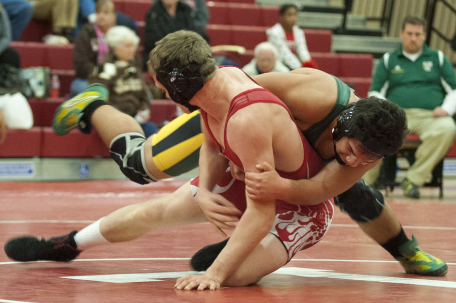 Wrestling: Flames rumble past Bulldogs 