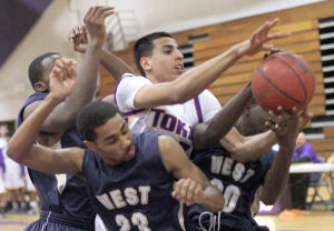 Boys basketball: Another close defeat drops Tigers to 0-2 