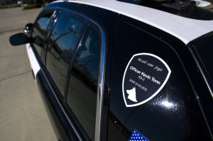 Fallen Galt Police Officer Kevin Tonn Laid To Rest : A decal commemorating Officer Kevin Tonn is displayed on the side of a Galt Police patrol car during the funeral for Tonn on Monday, Jan. 21, 2013.
 - Photo by Dan Evans/News-Sentinel