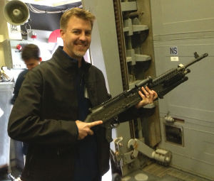 Two Lodi-area Men Spend Day On Destroyer To Learn What Navy Life Is Like: Ryan Sherman holds a powerful weapon used by Navy personnel, on Dec. 18, 2012.
 - Photo by Courtesy Photograph