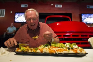 Lodi leaders try — and fail — to eat 6 pounds of beef and beans at sports grill’s opening