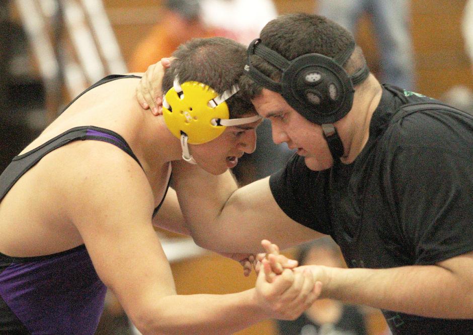 Wrestling: Tigers take down Rams in a rout 