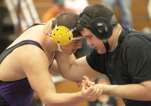 Wrestling: Tigers take down Rams in a rout 
