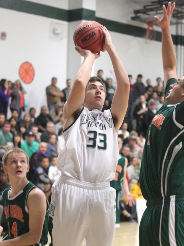 Boys basketball: Hawks too hot to handle