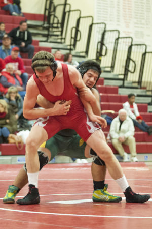 Wrestling: Flames rumble past Bulldogs 